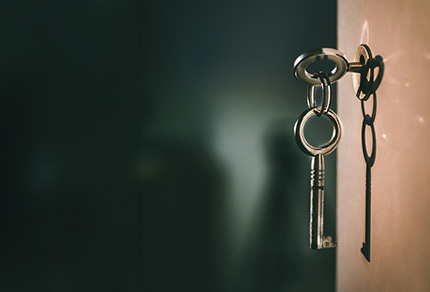 A key unlocking a door