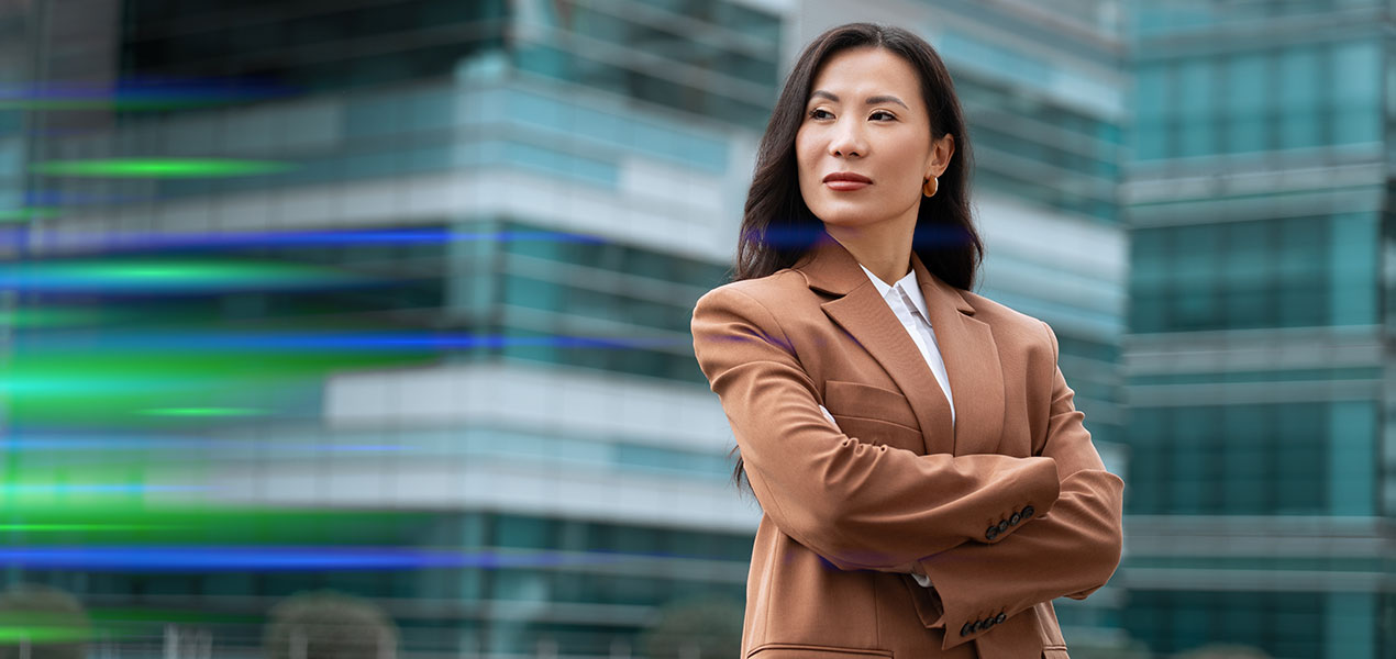 A professional woman with her arms crossed.