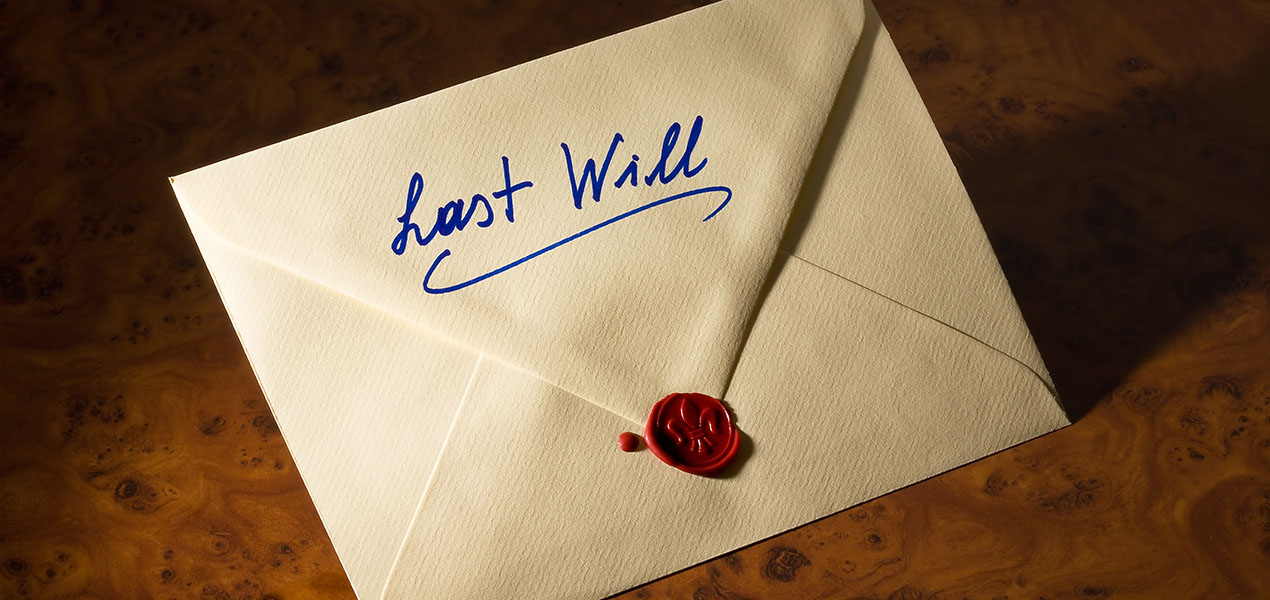 A sealed envelope with "last will" written on it.
