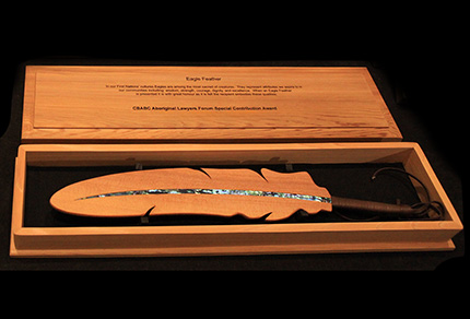 A wooden feather given to the ALF Special Contribution Award recipient