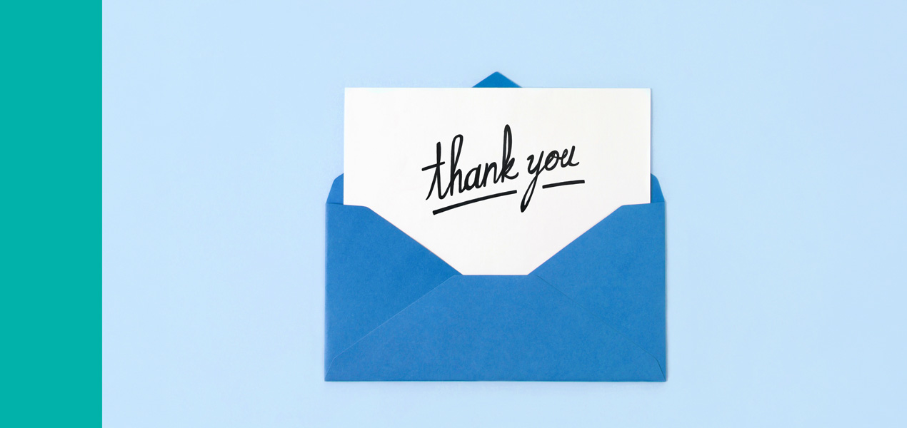 A thank you card in an envelope