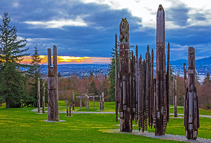 Wood carvings on Burnaby Mountain overlooking the valley.