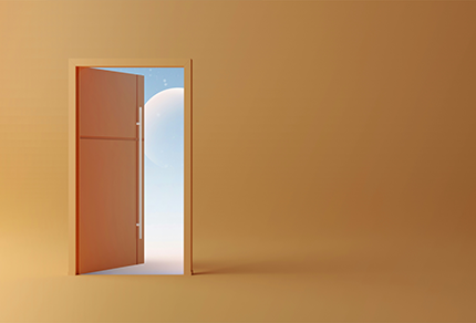 An open door showing the sky behind it. 