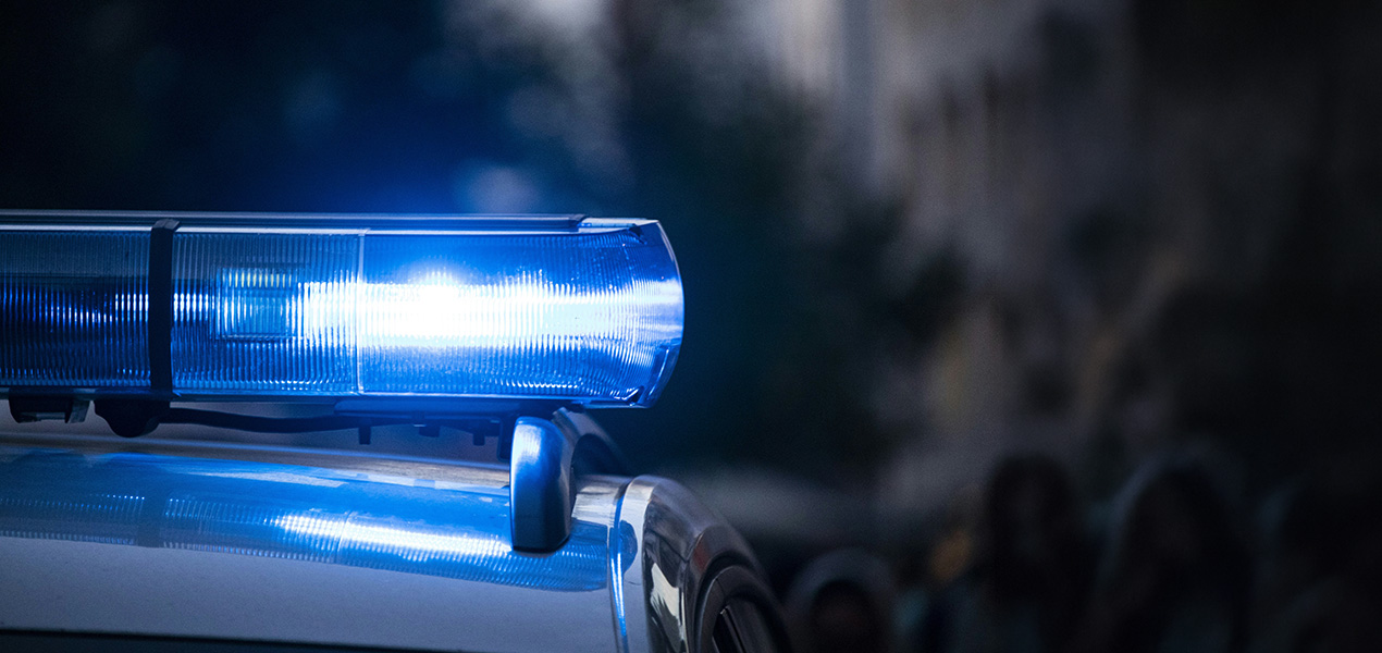 Close up of the lights on top of a police car.